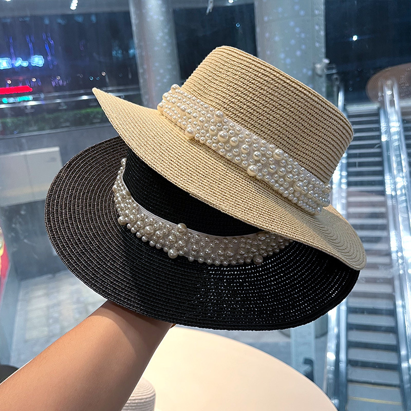 新作、つばが平らな麦わら帽子。パール装飾が施され、カジュアル - Bucket Hat Straw のレビューと価格