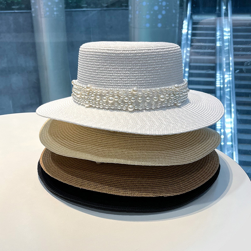 新作、つばが平らな麦わら帽子。パール装飾が施され、カジュアル - Bucket Hat Straw のレビューと価格